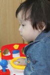Sarang in the SWS playroom during our 2nd visit — wearing the little denim&nbsp;blazer…