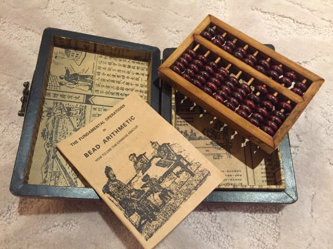 We found this traditional wooden Chinese abacus for Wen Jie on Shamian Island.